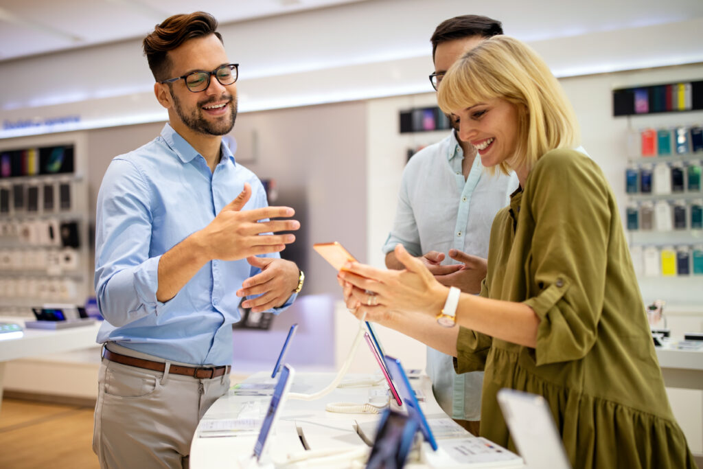 A sales representative educating his clients on the product he’s offering.